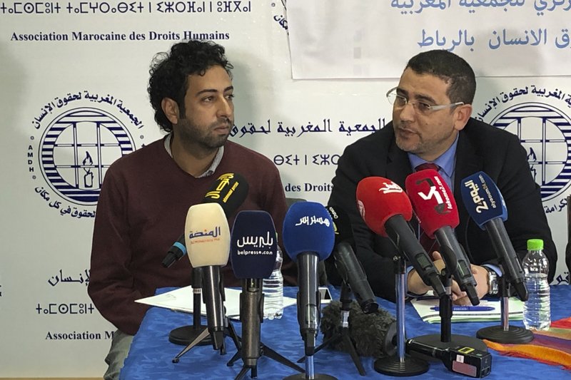 Omar Radi and his lawyer Miloud Kandil at a press conference  in Rabat in 2020 [AP]