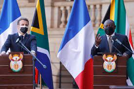 French President Emmanuel Macron and President Cyril Ramaphosa at the Union buildings in Pretoria [Al Jazeera]