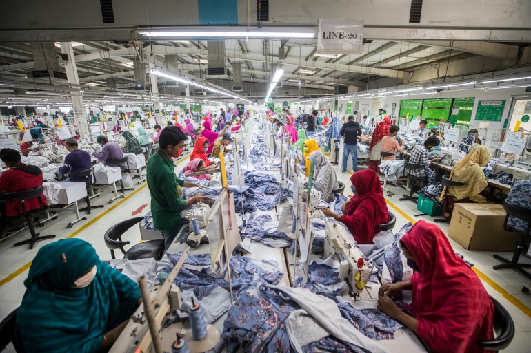 Bangladeshi men and women at work/Aljazeera