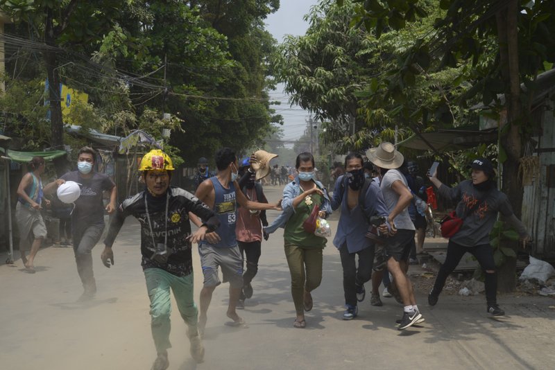 Anti-coup protesters in Yangon, Myanmar in March 2021 [AP}