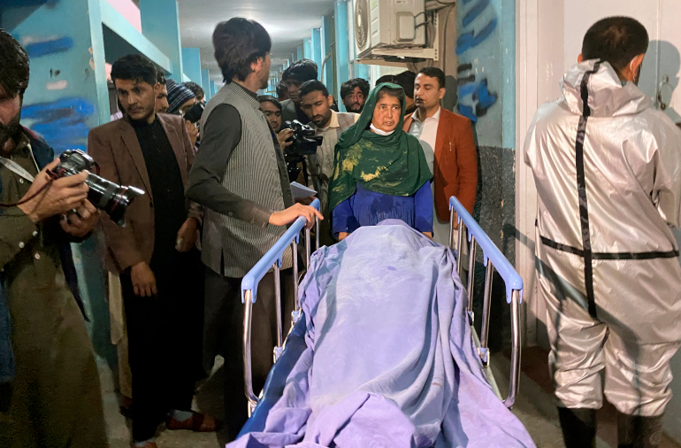 The body of a female media worker killed in Jalalabad in 2020 [Sadaqat Ghorzang/AP photo]