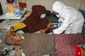 A patient in Martini hospital, Mogadishu, 24 February 2021 [AP/Farah Abdi Warsameh]