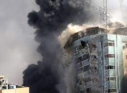 Al Jalaa building being destroyed on 15 May 2021 [Hatem Moussa /AP]