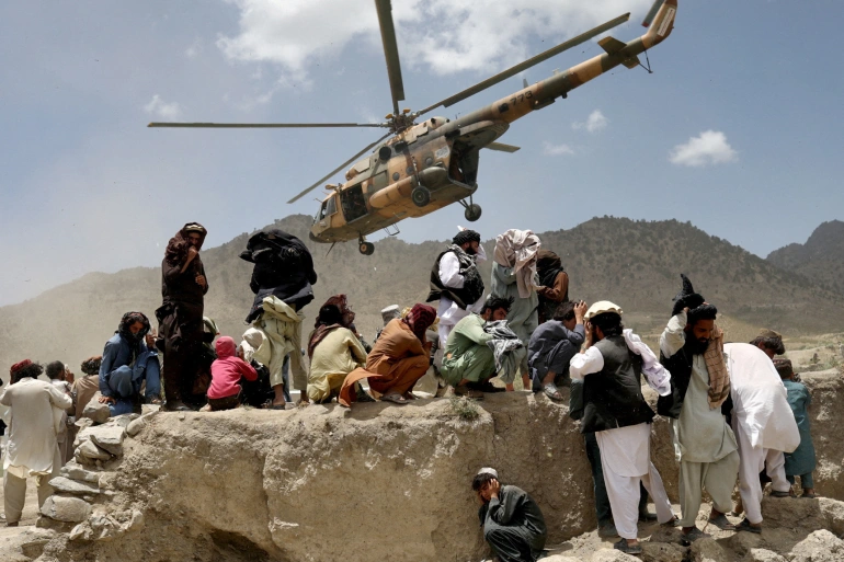 Taliban helicopter evacuating survivors/Aljazeera.