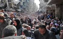 Syrian demonstrators/ Aljazeera/Archive.