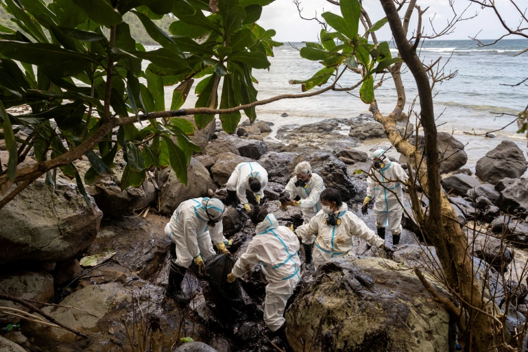 An aerial view shows the oil spill from the tanker MT Princess Empress on the shores of Pola in Oriental Mindoro province [File: Eloisa Lopez/Reuters]