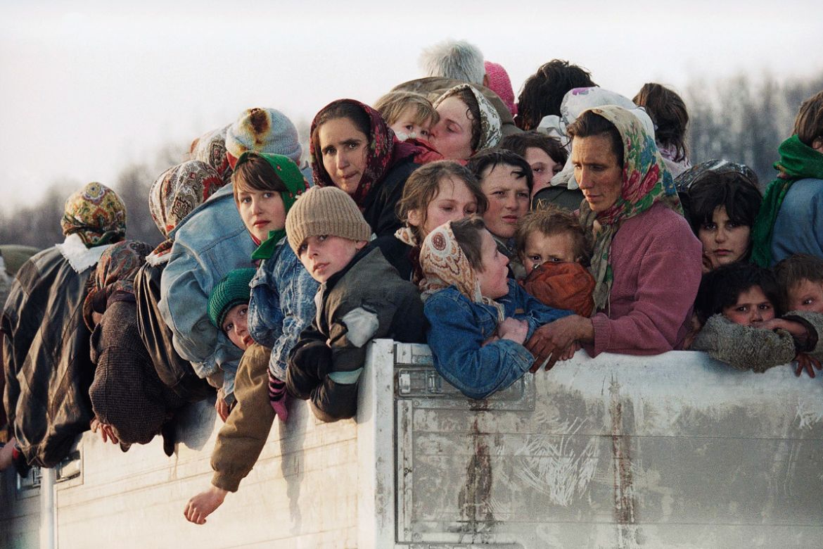 Archive/Muslim evacuees left Srebrenica on UN trucks for Tuzla. [Michel Euler/AP Photo]