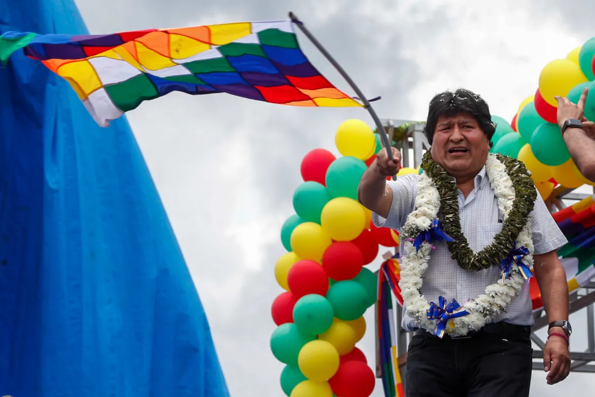 Former Bolivian President Evo Morales waves during a rally with supporters in Chimore, Bolivia, November 11, 2020, from where he flew into exile one year ago. Morales, the nation's first Indigenous president, returned to Bolivia on Monday and led a caravan to this coca-growing region of Cochabamba province where he began his political career, following an election that returned his party to power. [Juan Karita/AP Photo]