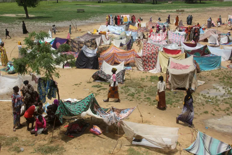 Flood victims set up makeshift shelters at a schoolyard where they take refuge after heavy rains, in N'Djamena, Chad September 2, 2022 [Mahamat Ramadane/Reuters]