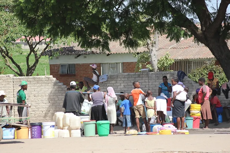 In Zimbabwe, the task of gathering enough clean water to drink, cook and wash is consuming many people's lives, with women and children bearing the brunt of the shortage [File: Chris Muronzi/Al Jazeera]