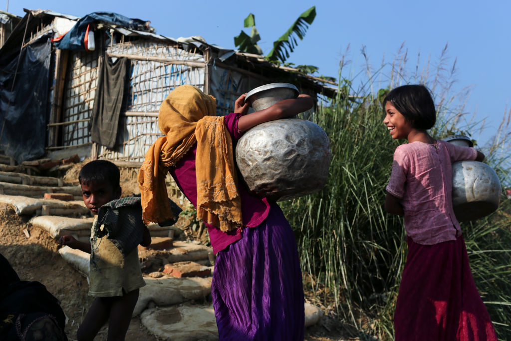 Three Rohingya refugees in Bangladesh/Aljazeera.