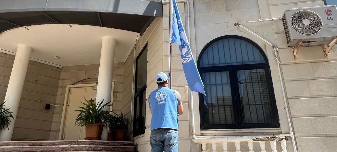 UNMHA The United Nations flag is lowered at a UN building in Yemen.