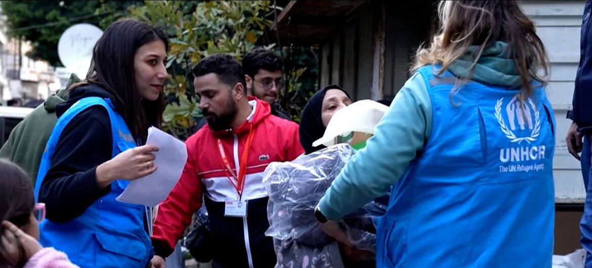 UNHCR UN refugee agency staff distribute emergency relief items to displaced people in Beirut, Lebanon.