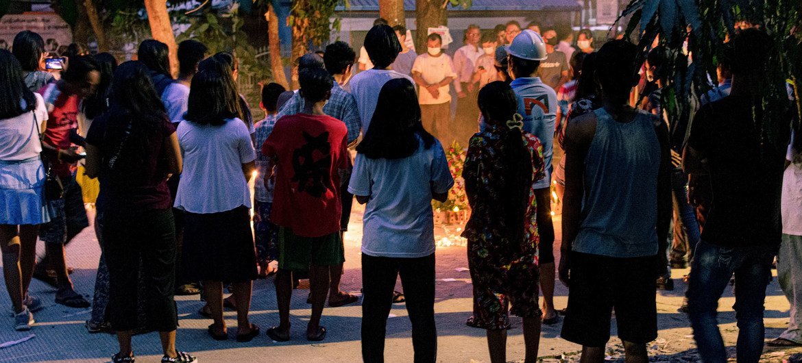 Unsplash/Zinko Hein People in Myanmar organize a vigil in the days after the military coup in 2021. (file photo)