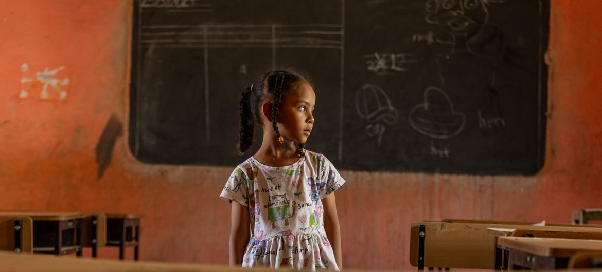UNICEF/Elfatih 6-year-old Fatima, from Khartoum stands in an empty classroom at the UNICEF supported safe learning space in Kassala state, Sudan